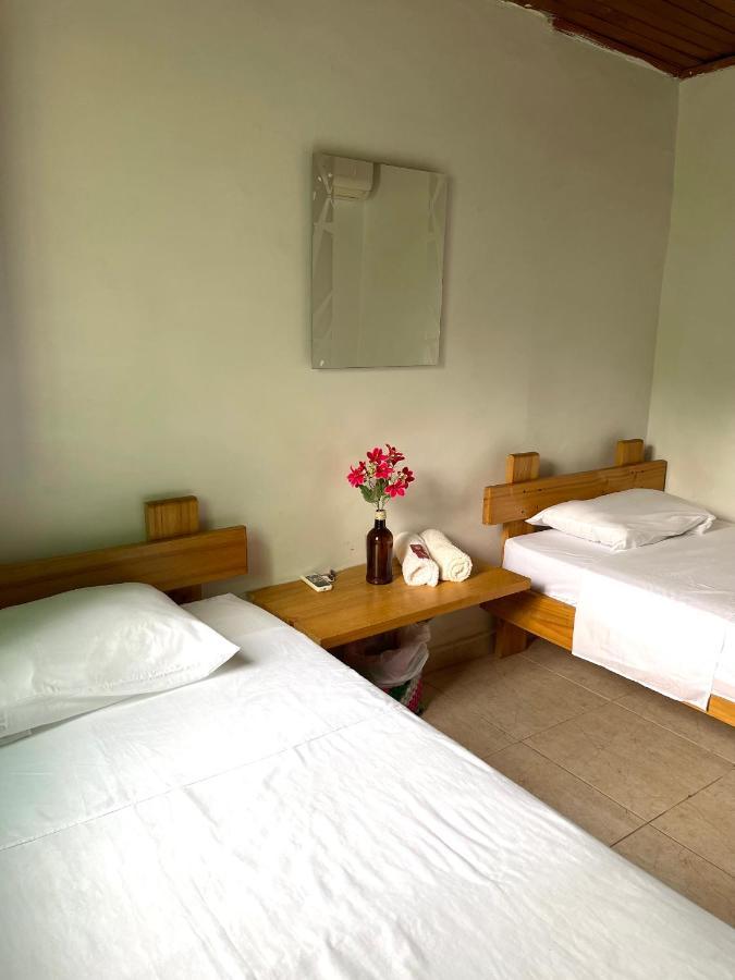 Ecohostal Palmares Del Rio Guachaca Buitenkant foto