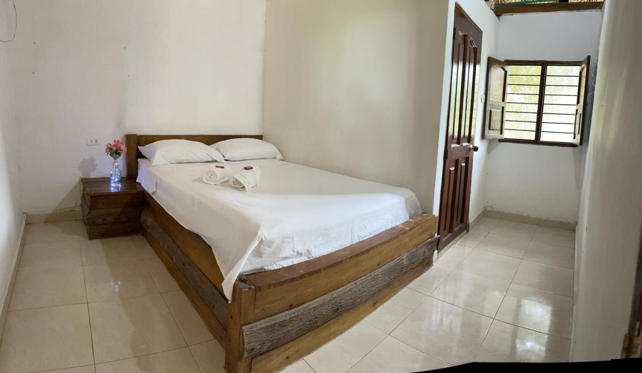 Ecohostal Palmares Del Rio Guachaca Buitenkant foto