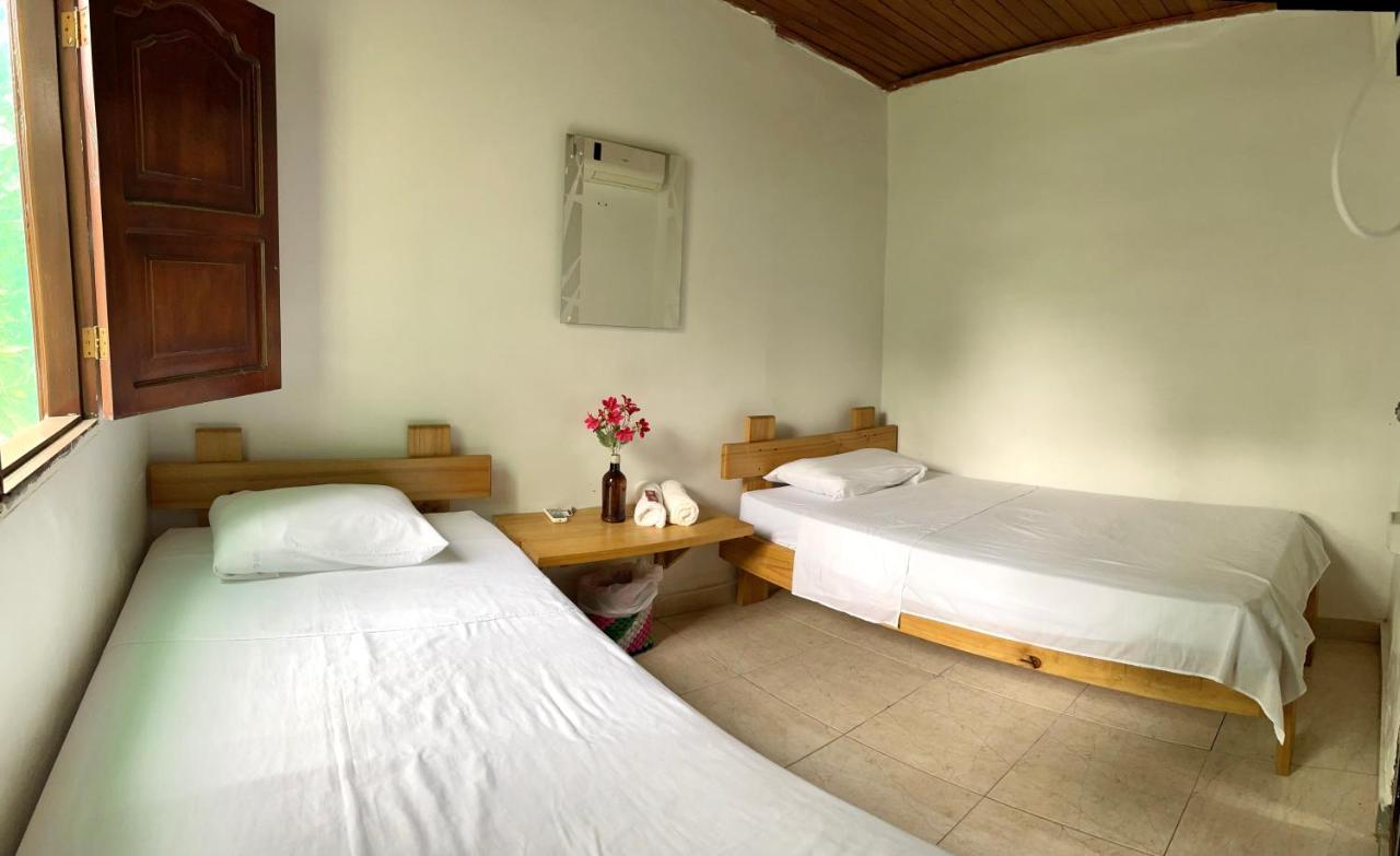 Ecohostal Palmares Del Rio Guachaca Buitenkant foto